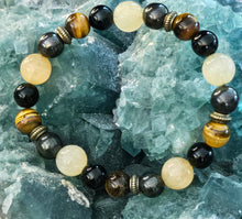 Load image into Gallery viewer, Honey Calcite, Hematite, Obsidian and Tigers Eye Bracelet
